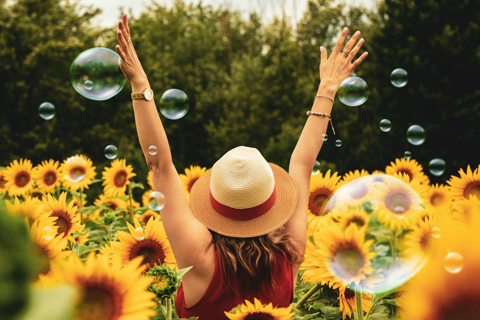 A woman feeling free and well outdoors after addressing her food and environmental triggers